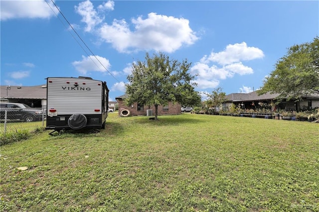 view of yard with fence