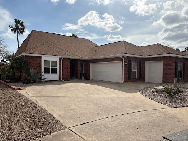 ranch-style home featuring a garage