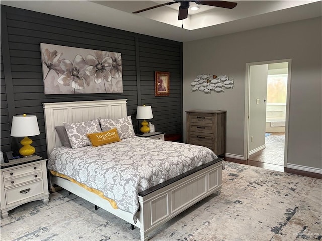 bedroom featuring ceiling fan and hardwood / wood-style floors