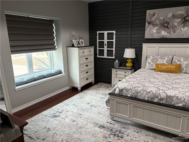 bedroom featuring dark wood-type flooring