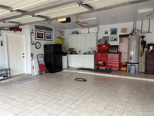 garage with a garage door opener, electric water heater, black refrigerator, and ceiling fan