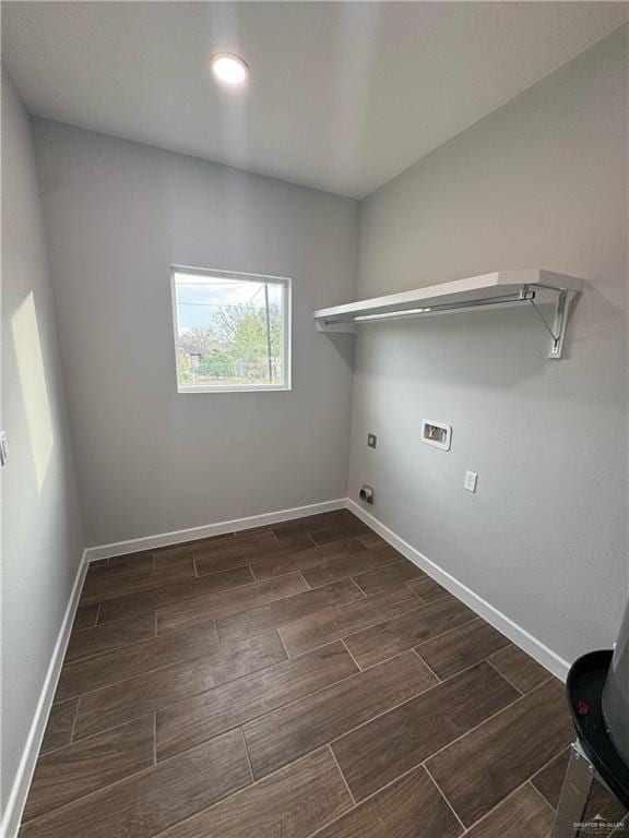 laundry area with laundry area, hookup for a washing machine, baseboards, and wood tiled floor