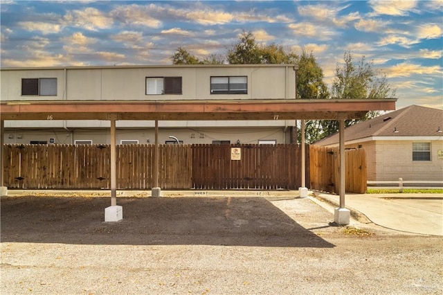 view of car parking with fence