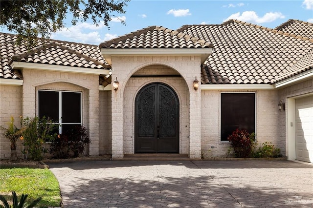 entrance to property with a garage