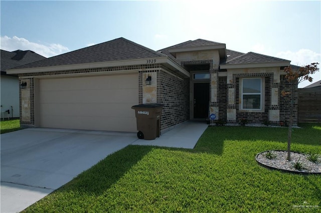 3929 Burr Dr, Edinburg, TX 78542 - view of front of property featuring an attached garage, brick siding, driveway, and a front yard