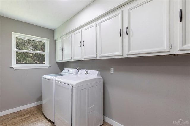 1409 Pine Ct, Harlingen, TX 78550 - washroom featuring cabinet space, washer and dryer, and light wood-style floors