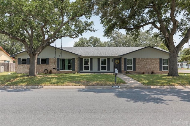 1409 Pine Ct, Harlingen, TX 78550 - ranch-style home featuring brick siding