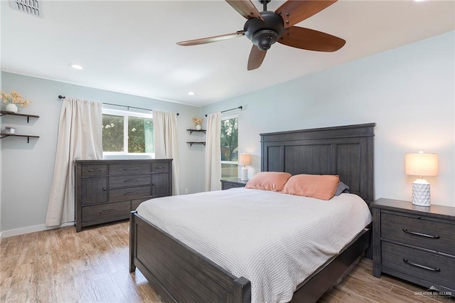 1409 Pine Ct, Harlingen, TX 78550 - bedroom with light wood-style flooring, recessed lighting, and ceiling fan