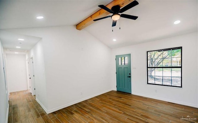 foyer entrance featuring lofted ceiling with beams, hardwood / wood-style flooring, and ceiling fan