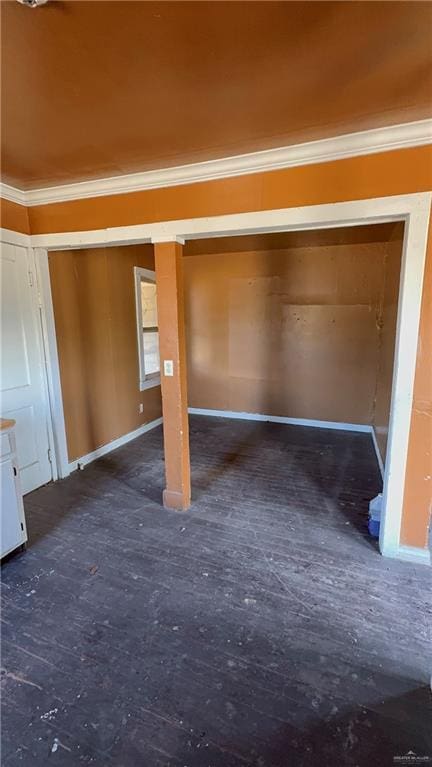 1002 Baize Ave, Donna, TX 78537 - unfurnished bedroom featuring crown molding