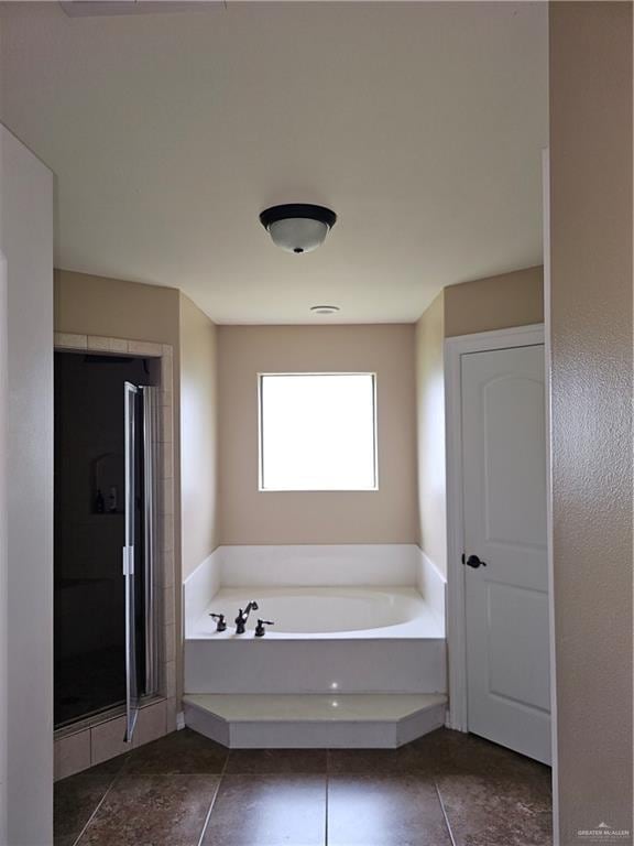 bathroom featuring a bath