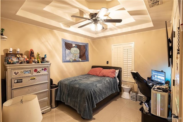 1033 Esteban Ave, Pharr, TX 78577 - bedroom with a raised ceiling, light tile patterned floors, and ceiling fan