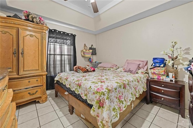 tiled bedroom with ceiling fan