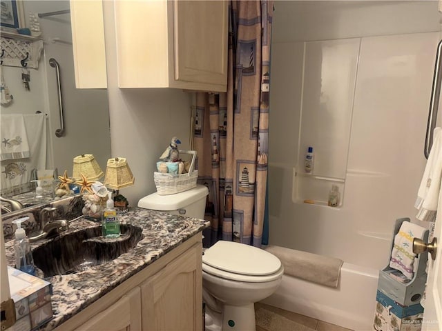 full bath featuring vanity and toilet