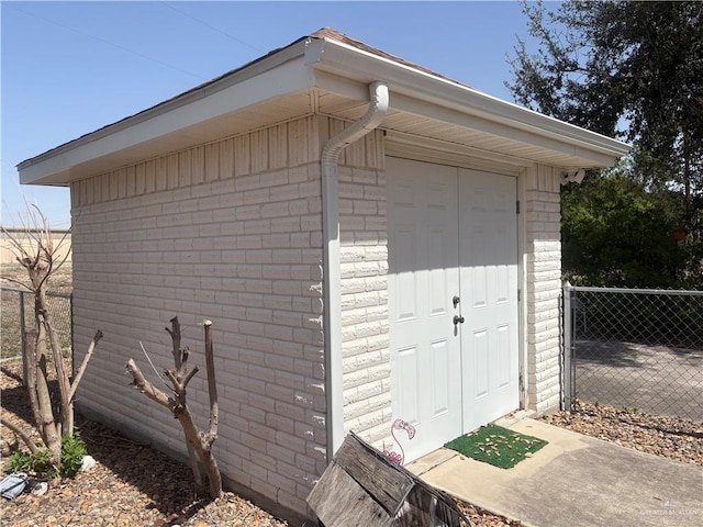 view of outdoor structure with an outdoor structure and fence