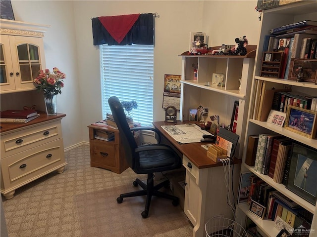 office space featuring baseboards