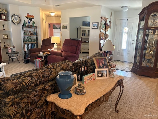 living area featuring visible vents