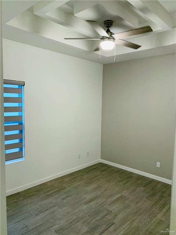 unfurnished room with ceiling fan and dark hardwood / wood-style floors