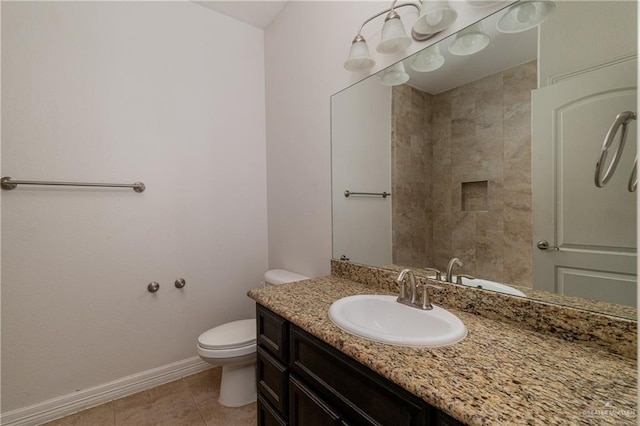 full bathroom with toilet, tile patterned flooring, baseboards, and vanity