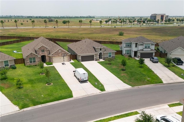 birds eye view of property featuring a rural view