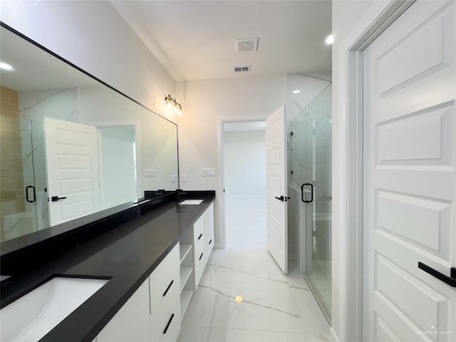 8104 N 51st St N, Mcallen, TX 78504 - full bathroom featuring a sink, double vanity, a marble finish shower, marble finish floor, and visible vents