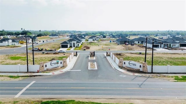 8104 N 51st St N, Mcallen, TX 78504 - view of street featuring a residential view, curbs, and street lights