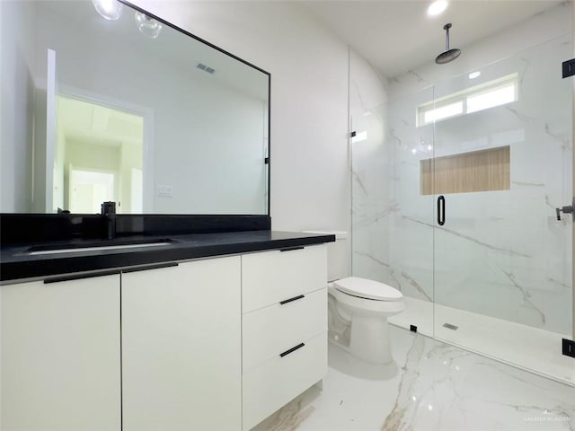 8104 N 51st St N, Mcallen, TX 78504 - full bathroom featuring vanity, marble finish floor, a marble finish shower, and toilet