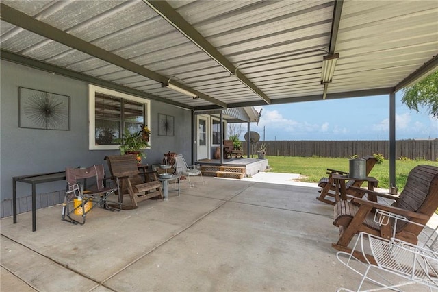 view of patio featuring fence