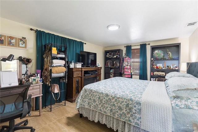 bedroom with visible vents