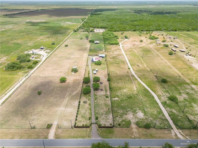 birds eye view of property featuring a rural view