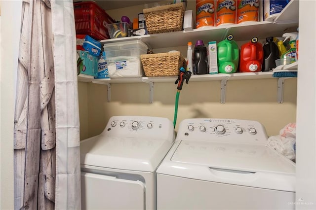 clothes washing area featuring laundry area and independent washer and dryer