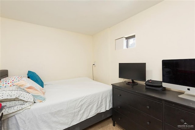 bedroom with light carpet