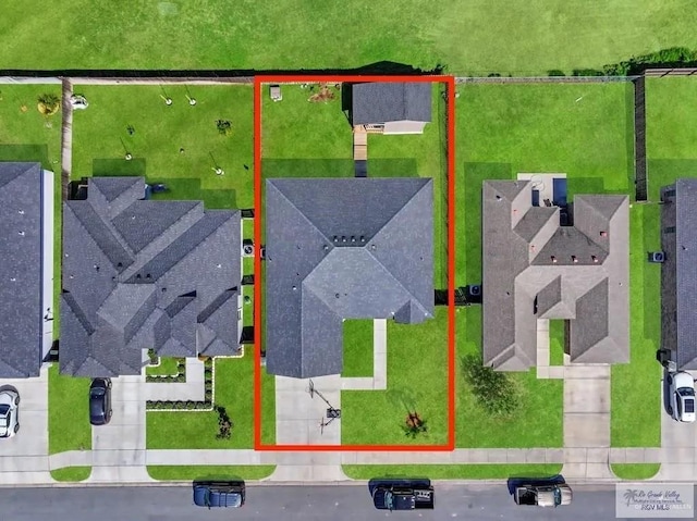 8718 Pink Flamingo St, Harlingen, TX 78552 - aerial view of property and surrounding area featuring property parcel outlined