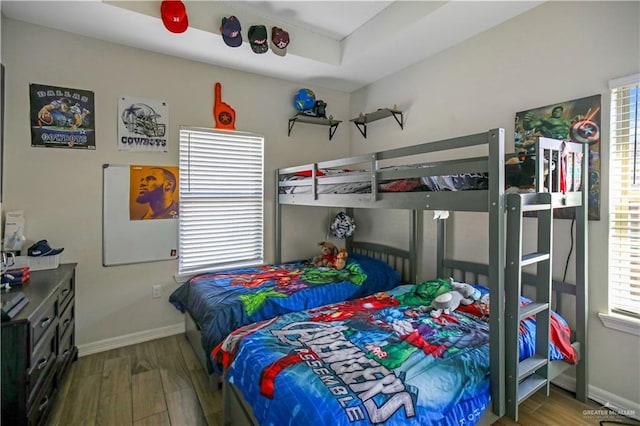 8718 Pink Flamingo St, Harlingen, TX 78552 - bedroom featuring wood finished floors and baseboards