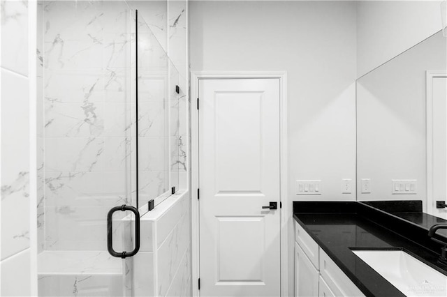 4216 Xenops Ave, Mcallen, TX 78504 - bathroom with vanity and a marble finish shower