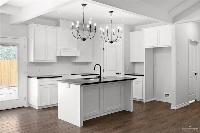 4216 Xenops Ave, Mcallen, TX 78504 - kitchen with a sink, a chandelier, dark countertops, a center island with sink, and recessed lighting