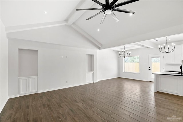 4216 Xenops Ave, Mcallen, TX 78504 - unfurnished living room featuring a chandelier, dark wood finished floors, a ceiling fan, baseboards, and recessed lighting