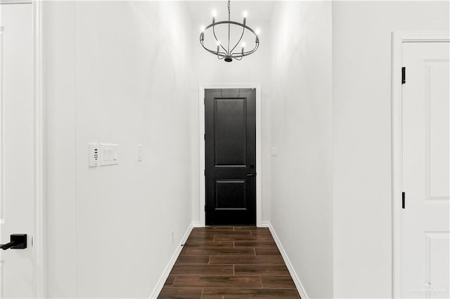 4216 Xenops Ave, Mcallen, TX 78504 - entryway featuring a chandelier, dark wood-type flooring, and baseboards