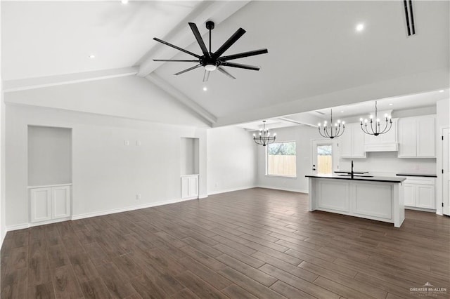 4216 Xenops Ave, Mcallen, TX 78504 - unfurnished living room with a chandelier, a sink, dark wood-style floors, ceiling fan, and recessed lighting