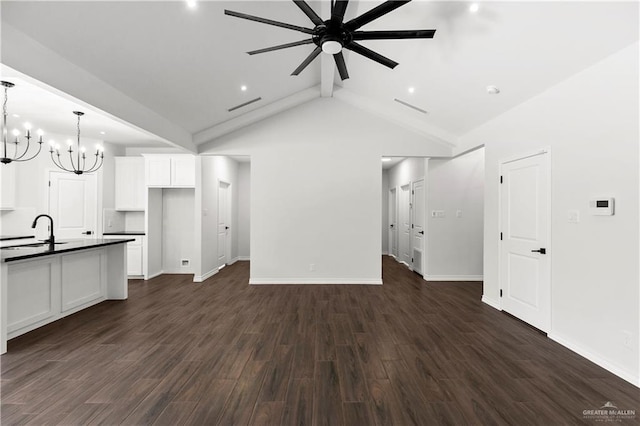 4216 Xenops Ave, Mcallen, TX 78504 - unfurnished living room featuring a chandelier, a sink, a ceiling fan, dark wood-type flooring, and recessed lighting