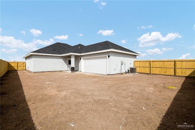 back of property with central AC unit