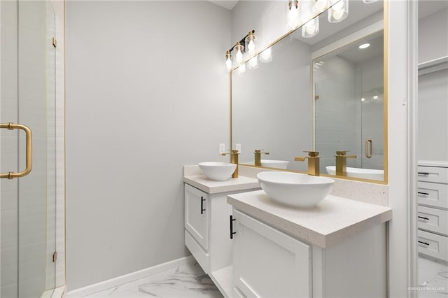 bathroom featuring vanity and an enclosed shower