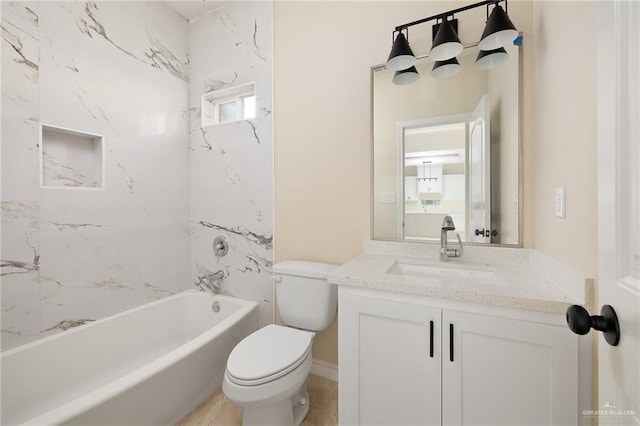 full bathroom with vanity, toilet, and tiled shower / bath combo