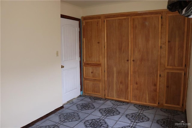 unfurnished bedroom with a closet