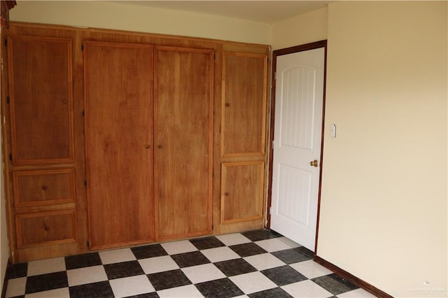 unfurnished bedroom featuring a closet