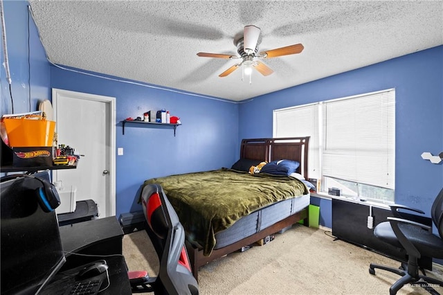 1729 W Jefferson St, Weslaco, TX 78599 - carpeted bedroom with an office area, a ceiling fan, and a textured ceiling