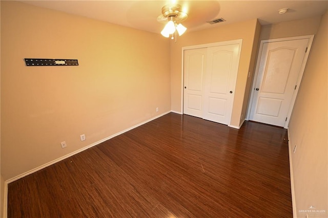 2316 Fairmont Ave, Mcallen, TX 78504 - unfurnished bedroom with dark wood-style flooring, a closet, and ceiling fan