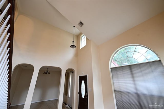 2316 Fairmont Ave, Mcallen, TX 78504 - tiled foyer entrance featuring high vaulted ceiling and arched walkways