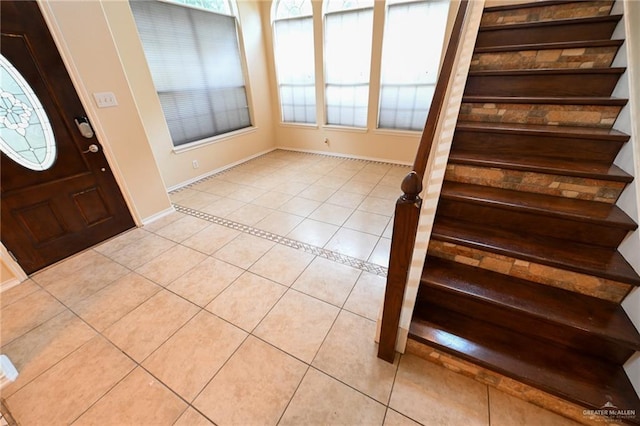 foyer with light tile patterned floors