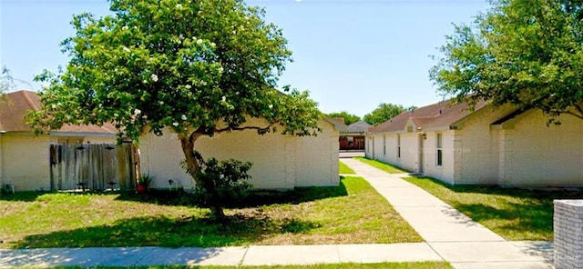 view of home's exterior featuring a yard